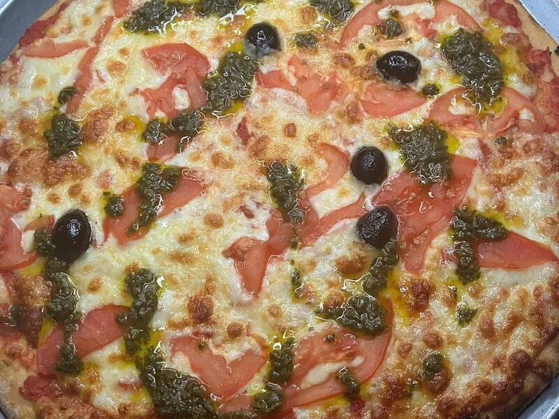 Pizza pesto tomates fraîches mozzarella artisanale Marseille